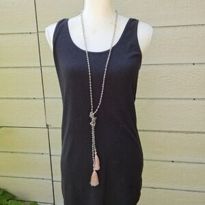 clear gray crystal beads on mauve cording with tassels